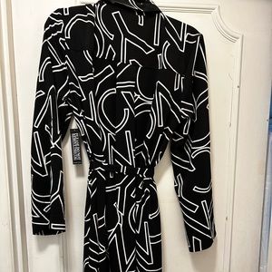 Brand new black&white long dress with self belt and flare sleeves. Beautiful